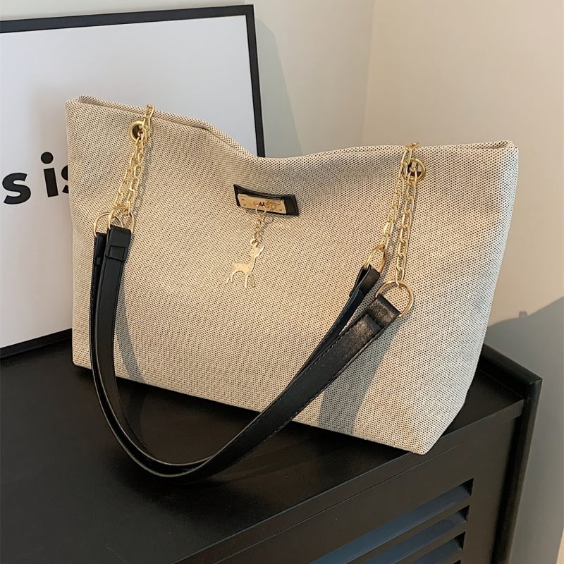 Borsa a tracolla da donna a tinta unita di grande capacità,